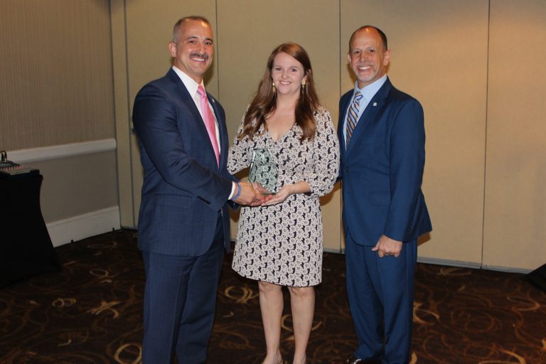 TPA Member Accepting Award from TPA CEO and President